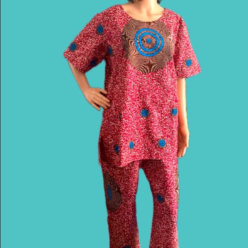 A SET OF A BLOUSE(TOP)AND PANTS.